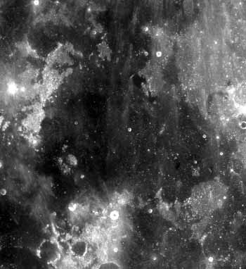 IMAGE ID: The lunar sea named Mare Cognitum. It almost looks like bleach tie-die. END ID